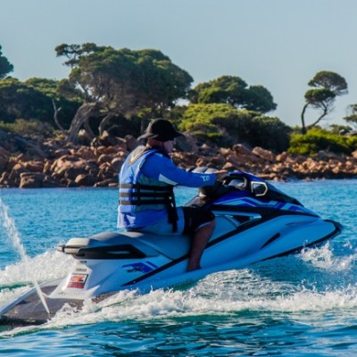 The owner riding his jet ski