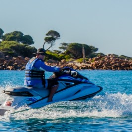 The owner riding his jet ski