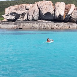 A guests swimming through the water