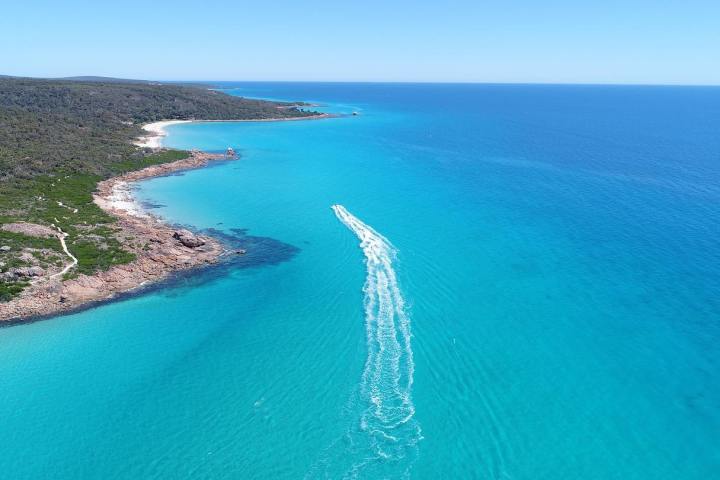 an island in the middle of a body of water